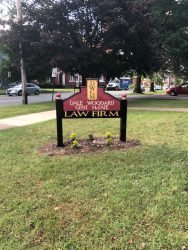 carved sign for law firm