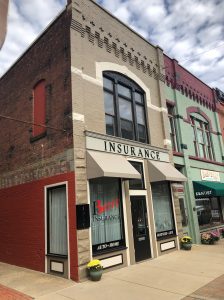 Wall mounted insurance company sign