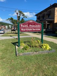real estate carved sign